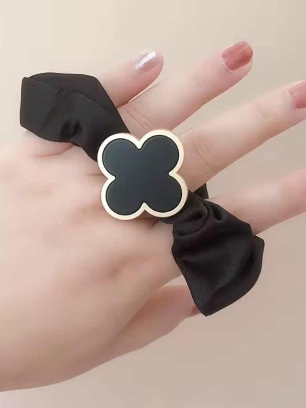 Macy's Black and Gold Clover Hair Tie Ring